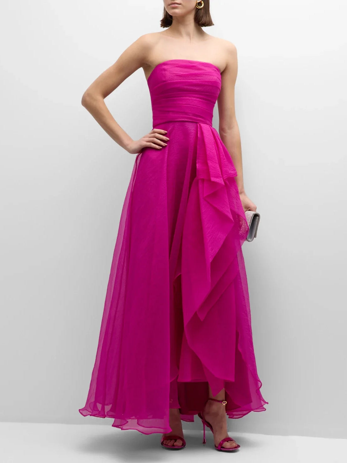 Fuchsia strapless ruffle A-line formal dress with layered chiffon skirt.