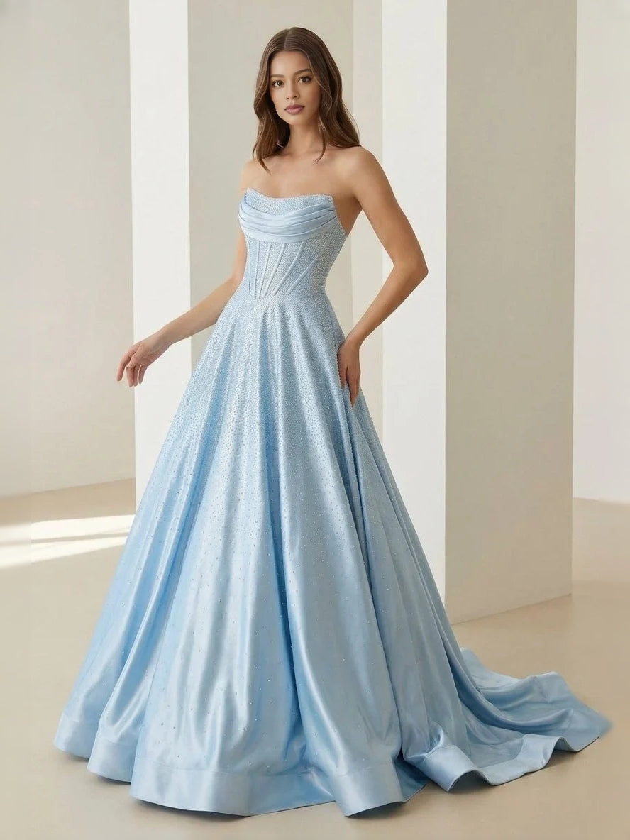 Light blue strapless draped corset ball gown with full floor-length skirt