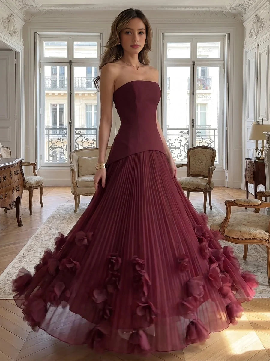 Deep red strapless A-line maxi gown, pleated bodice, layered ruffle skirt