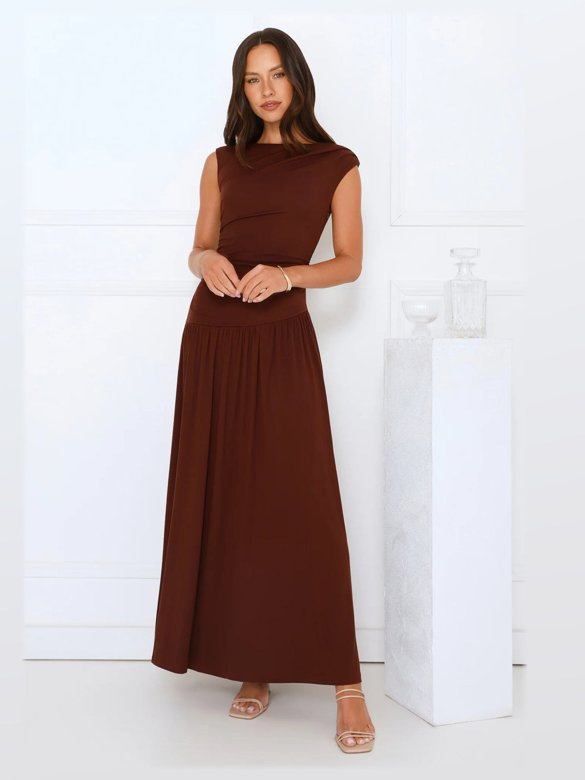 Brown maxi formal dress, front full-length view showing the neckline