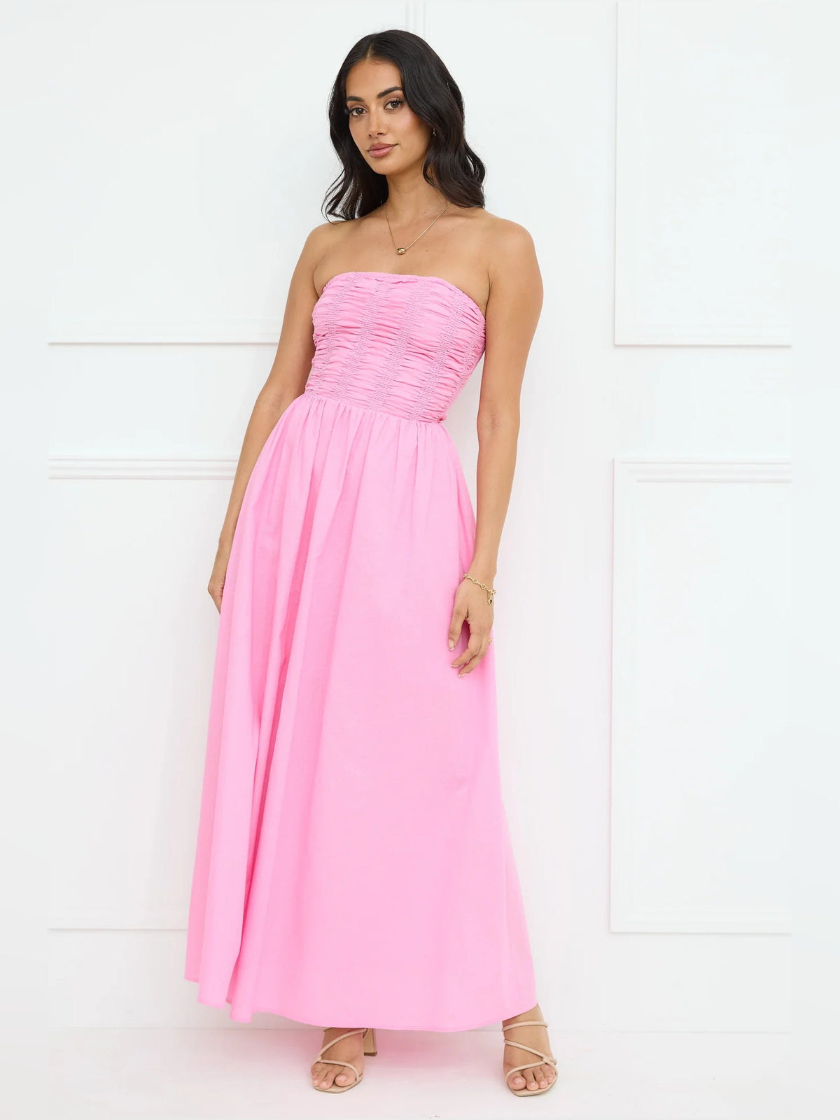 Pink strapless A-line maxi formal dress with ruched bodice and full skirt