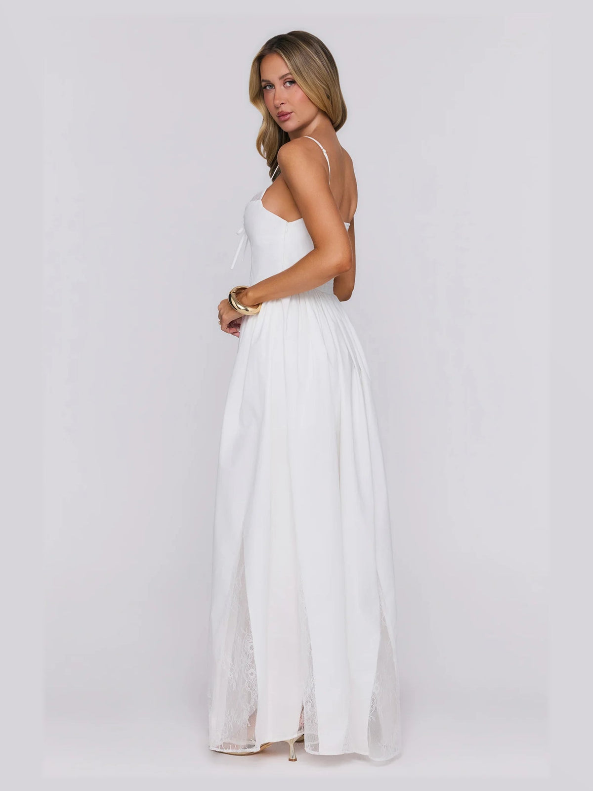 White formal dress with a-line silhouette and maxi length