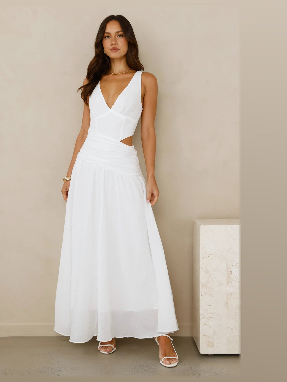 White formal dress with a-line silhouette and maxi length