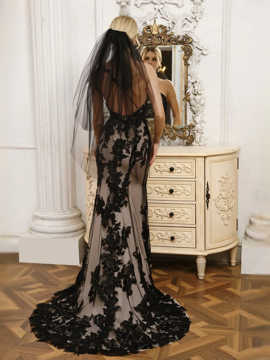 Black floral one-shoulder mermaid tulle wedding dress with sheer back and long train