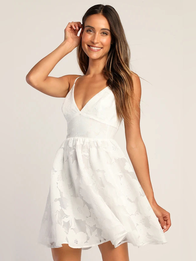 White floral mini dress, V-neck with spaghetti straps, gathered waist flare skirt