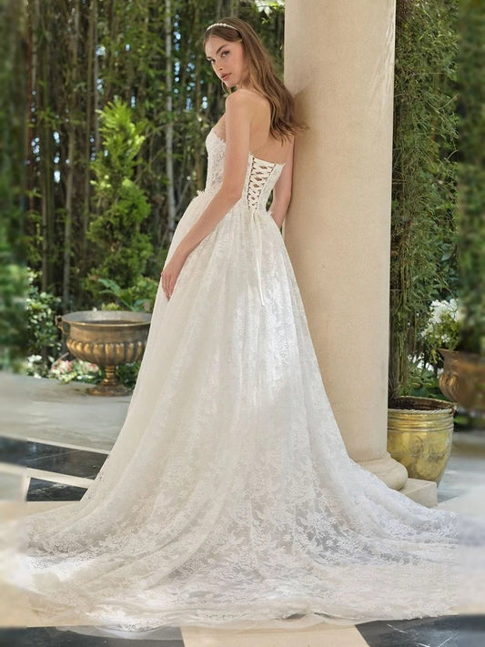 Ivory sweetheart corset wedding dress with lace bodice and tulle A-line skirt