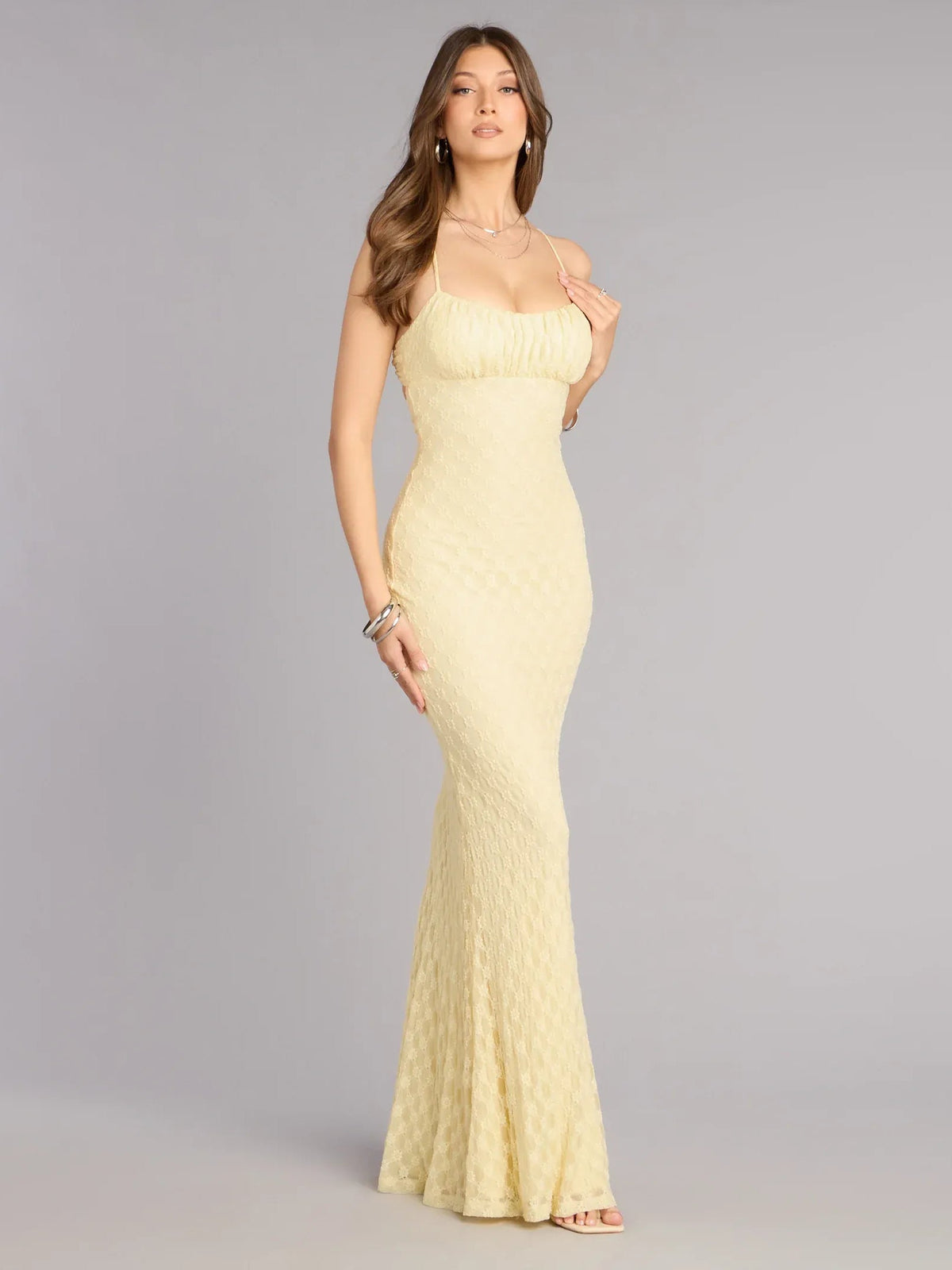 Yellow sweetheart neckline formal dress with spaghetti straps and ruched bodice, floor-length