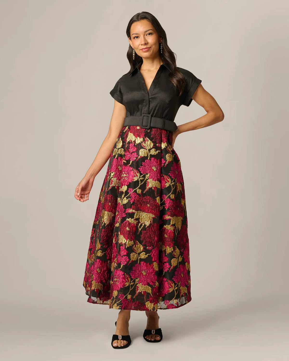 Black V-neck button dress with floral A-line maxi skirt and belted waist
