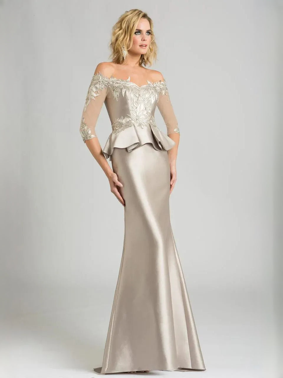 Champagne off-shoulder formal gown with silver beaded floral bodice and peplum hem