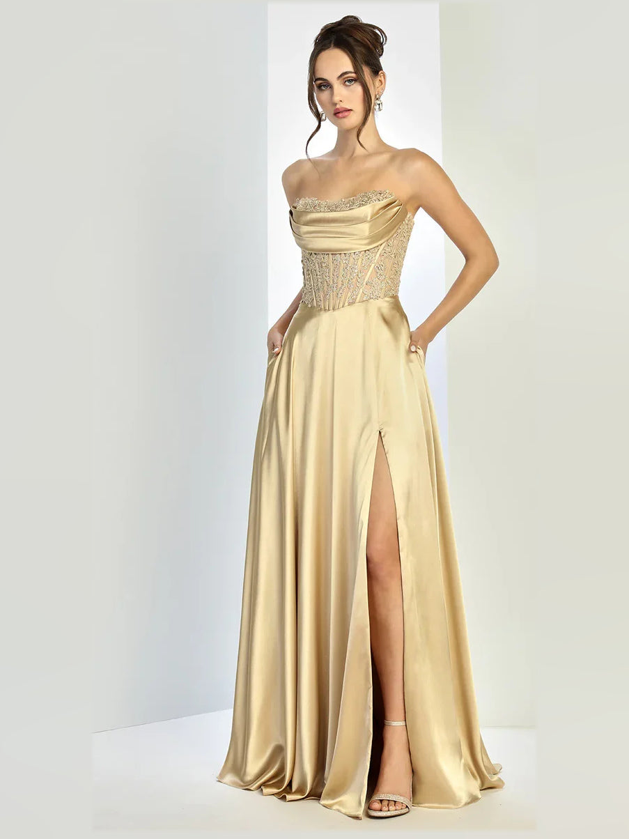 Champagne strapless corset A-line satin prom dress with jeweled bodice and leg slit