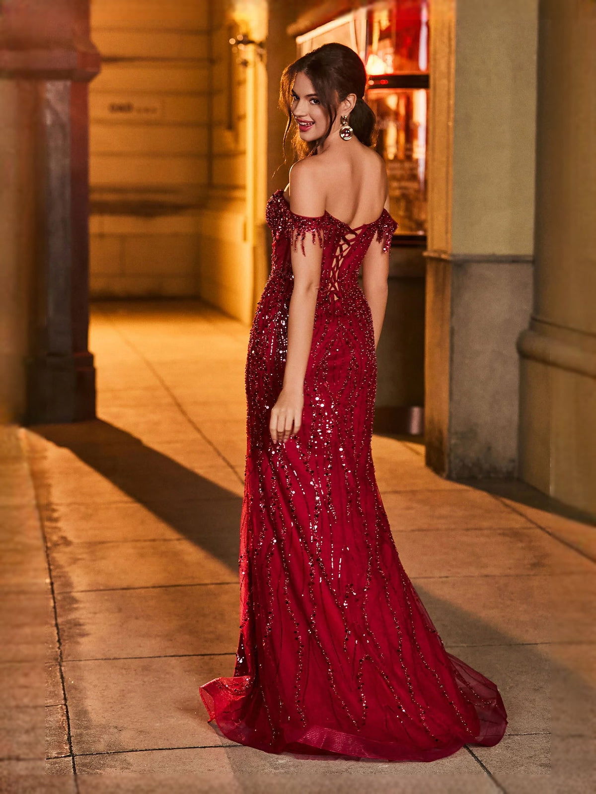 Burgundy sequin sweetheart maxi prom dress with ruched bodice and high slit
