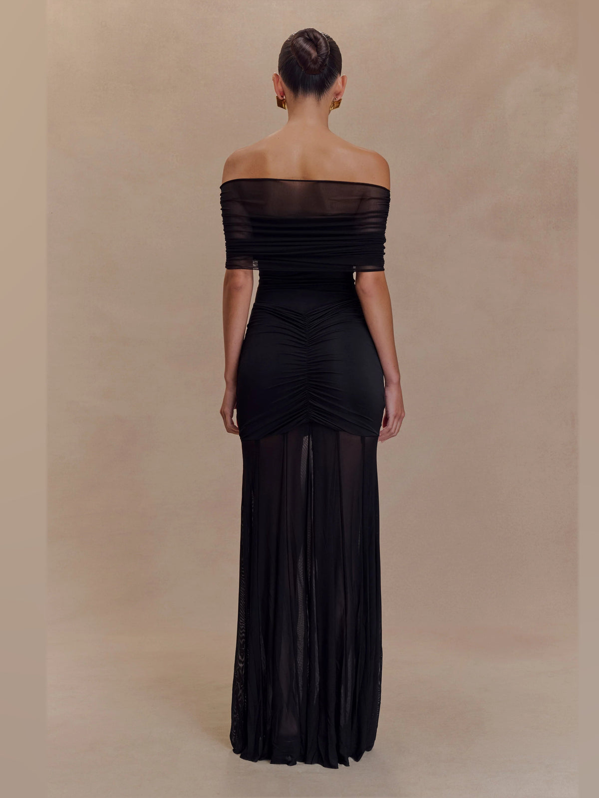 Black formal dress with a-line silhouette and maxi length