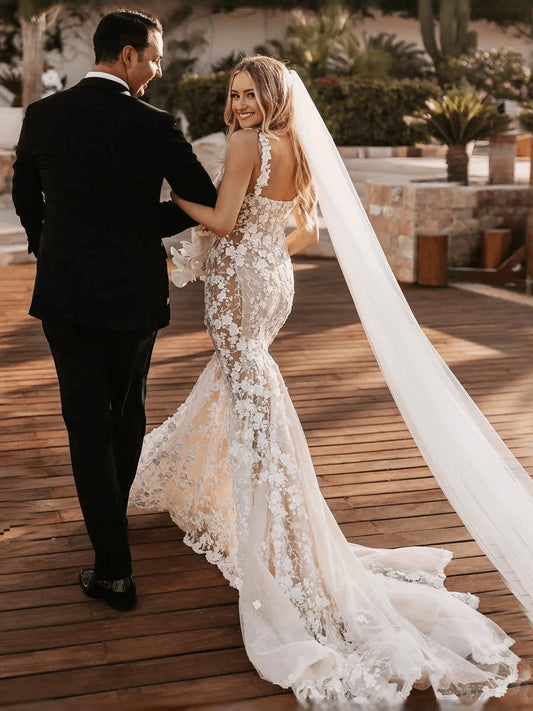 Ivory floral lace mermaid wedding dress with open back and long veil