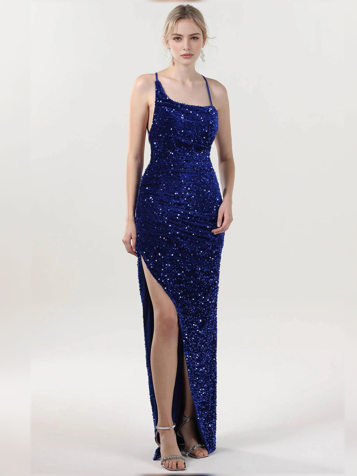 Dark blue cowl neck sequin formal dress with ruching and thigh-high slit