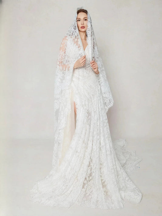 Ivory lace A-line wedding dress with V-neck, sleeveless bodice, thigh-high slit