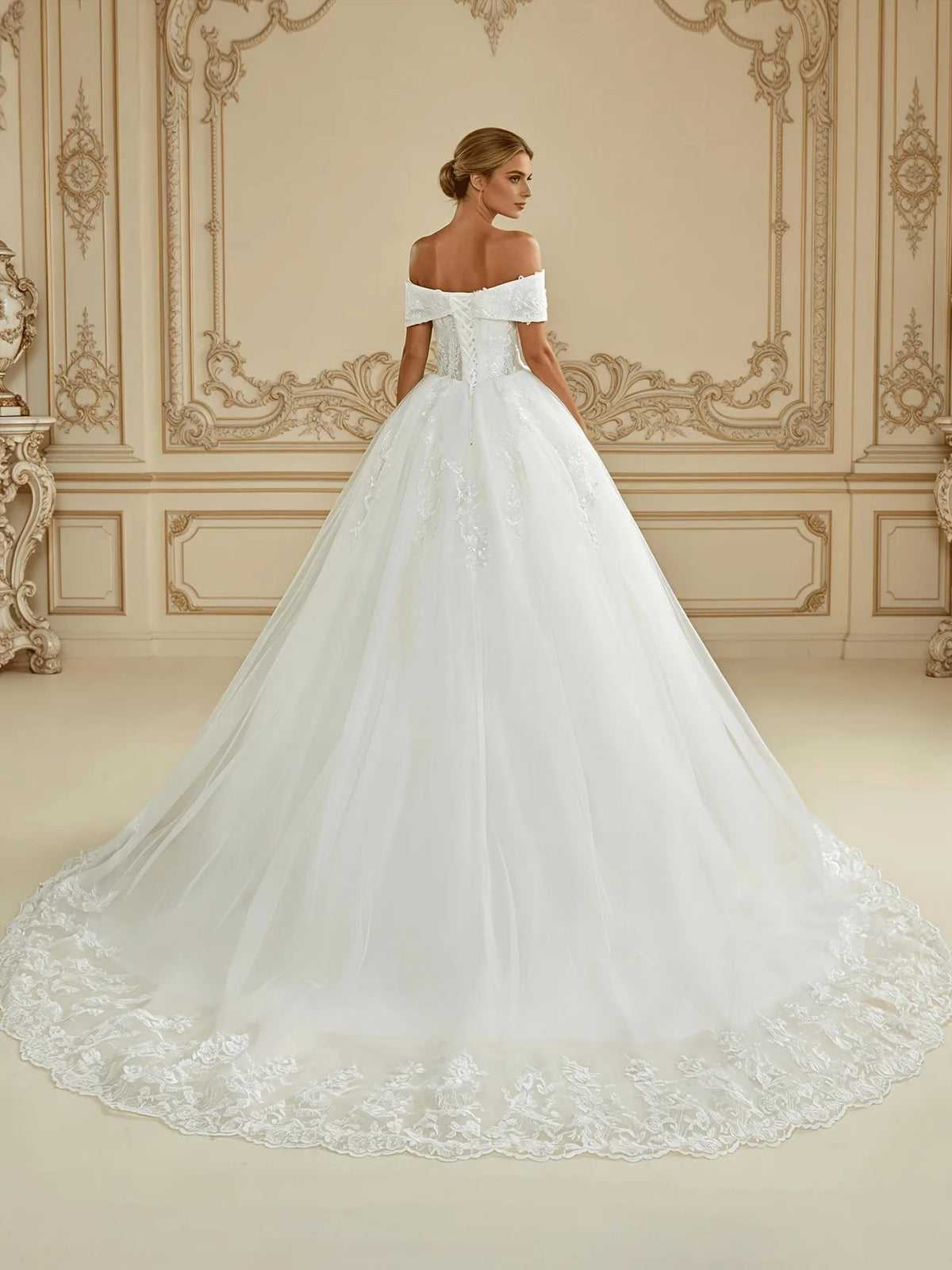 Ivory off-shoulder ball gown wedding dress with corset bodice and layered tulle skirt