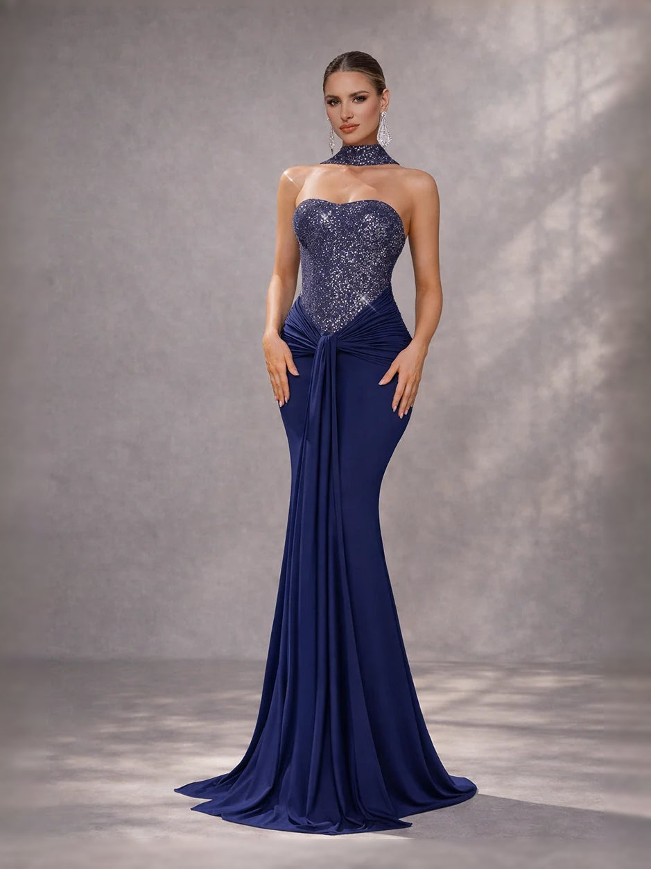 Dark navy sweetheart sequin mermaid prom dress with ruched bodice and flowing skirt