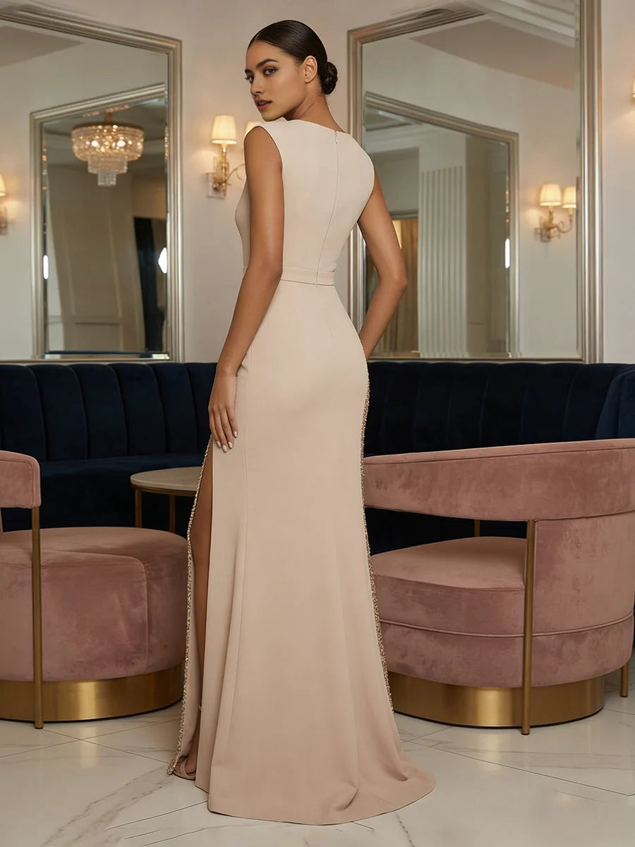 Champagne mermaid prom dress with bateau neck and back slit, floor-length satin