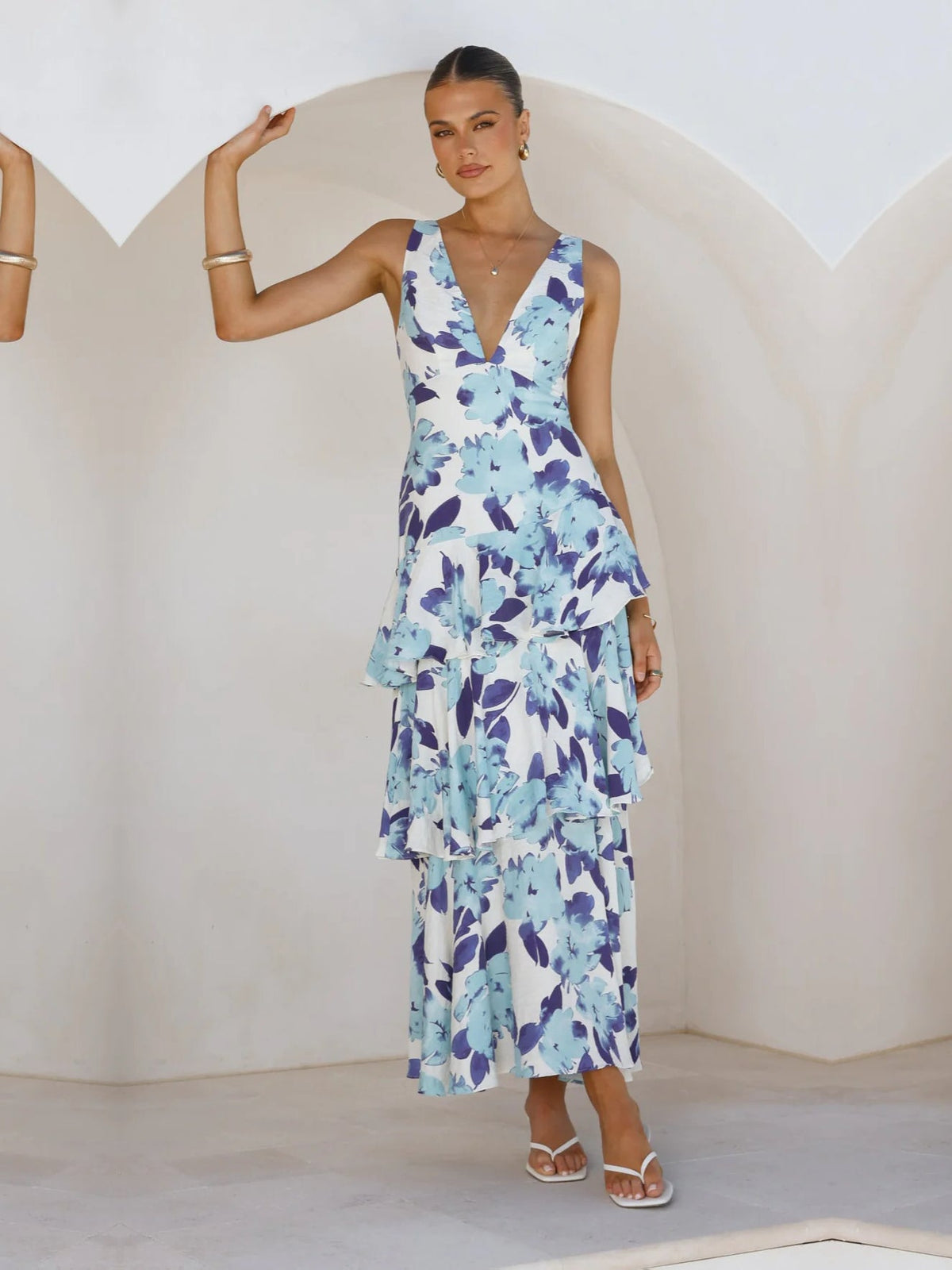 Blue Floral a-line maxi formal dress with V-neckline, full-length front view