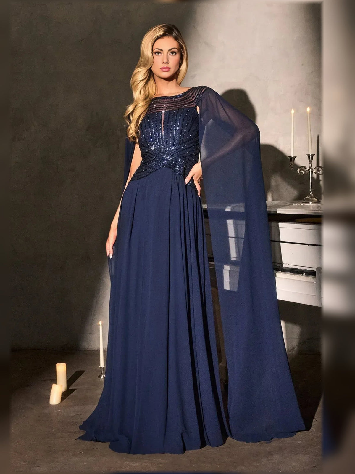 Navy chiffon A-line mother-of-the-bride dress with beaded bateau neckline and draped sleeve overlay