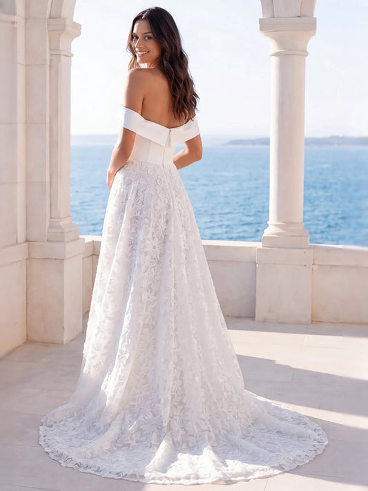 Ivory off-shoulder A-line wedding dress with floral lace bodice and full skirt