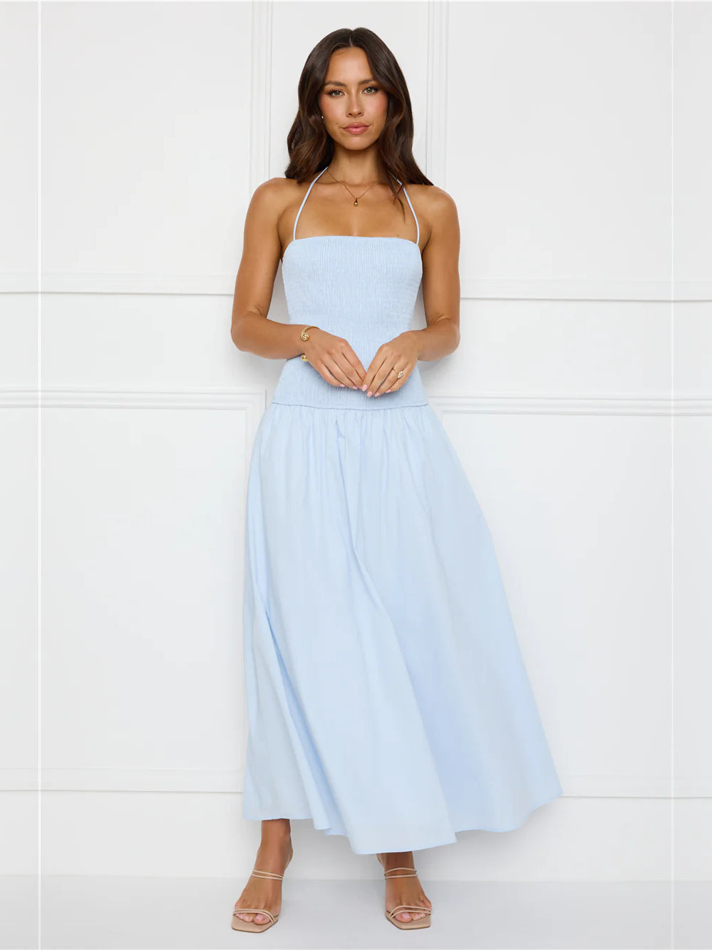 Blue a-line maxi formal dress with strapless neckline, full-length front view