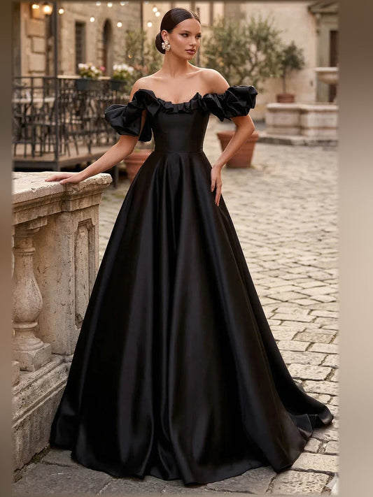 Black off-shoulder formal dress with ruffled sleeves and A-line skirt, floor length