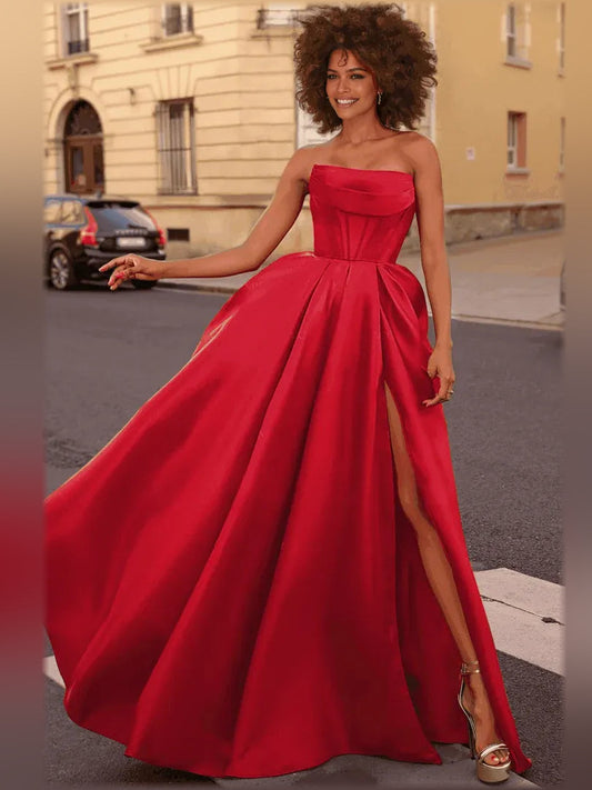 Red strapless corset formal dress with sweetheart neckline and thigh slit, floor-length