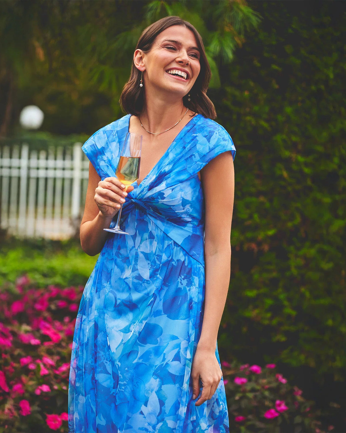 Blue floral V-neck maxi dress with cap sleeves and knotted twist front bodice