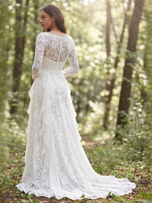 Ivory lace A-line wedding dress with bateau neck, long sleeves, layered chiffon ruffles and slit