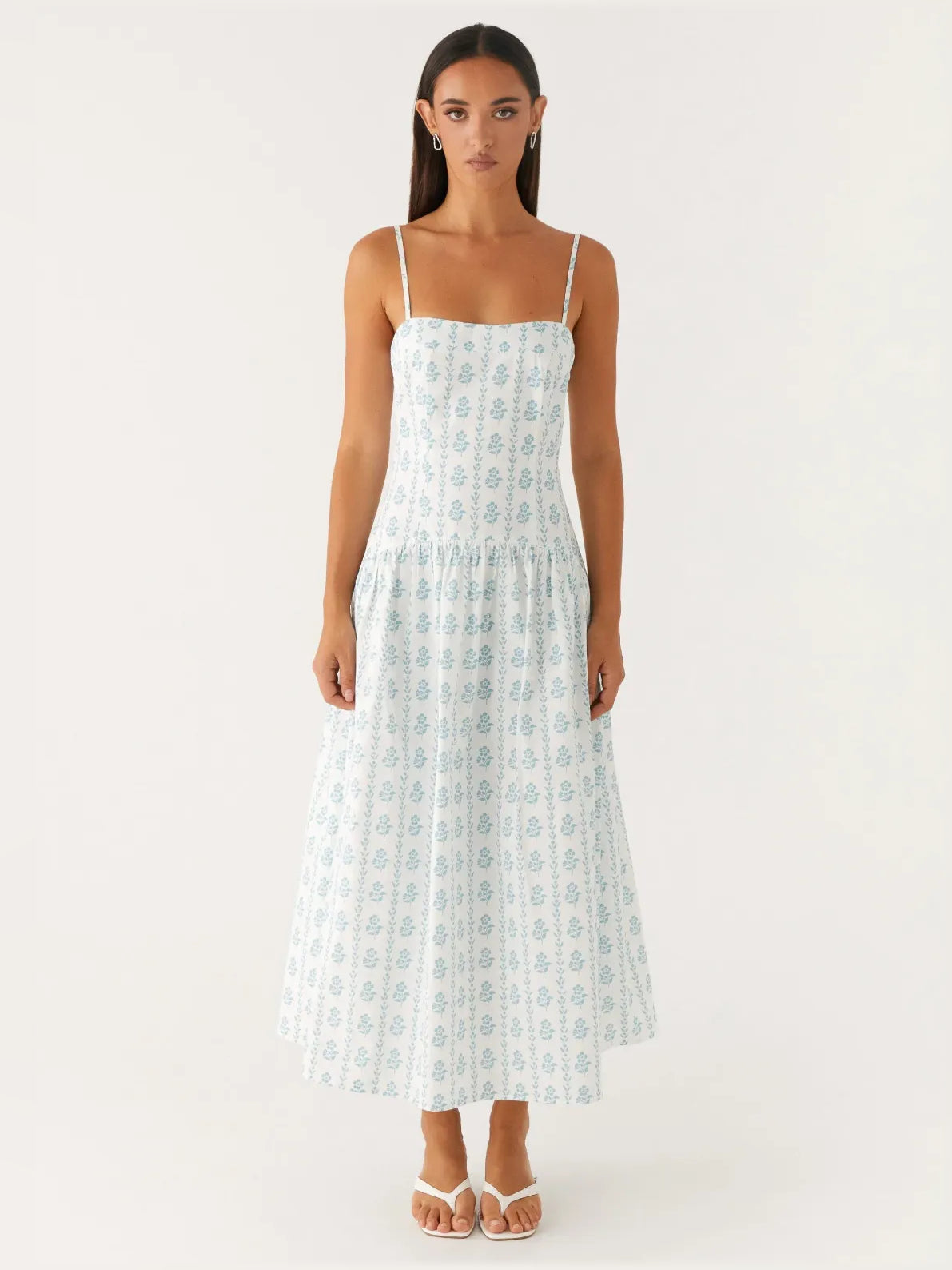 Light blue printed midi formal dress with square neckline and spaghetti straps