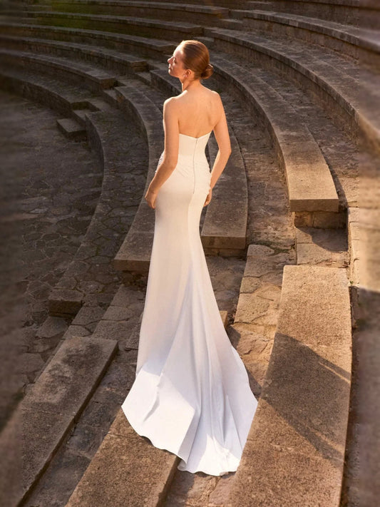 Ivory satin mermaid wedding dress with draped corset and V-neck, floor-length hem