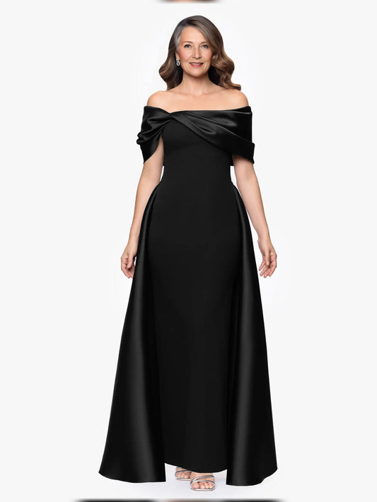 Black off-shoulder A-line gown with draped neckline, ruched bodice, and slit