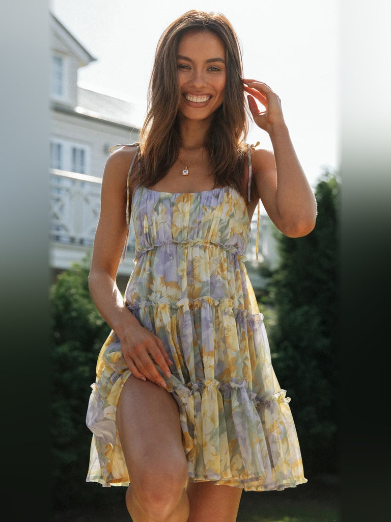 Floral tiered mini dress with spaghetti straps and ruffled square neckline