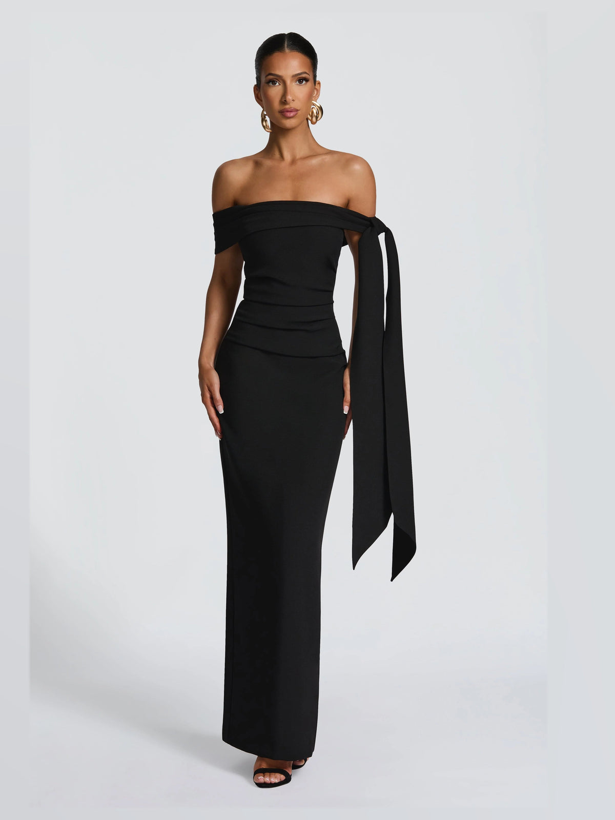 Black maxi formal dress, front full-length view showing the neckline