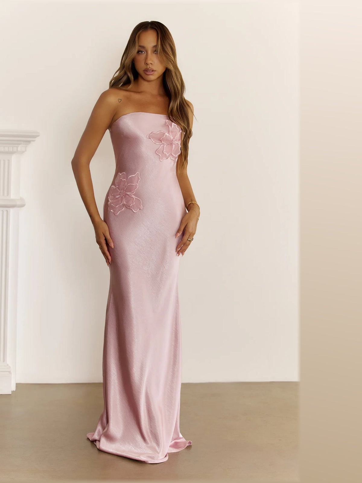 Pink formal dress with a-line silhouette and maxi length