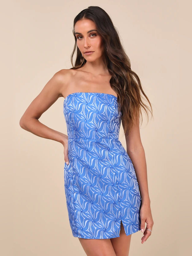 Blue strapless mini homecoming dress with abstract blue-and-white pattern, fitted bodice