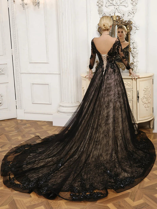 Black sequin A-line wedding dress with open-back corset bodice and long tulle skirt