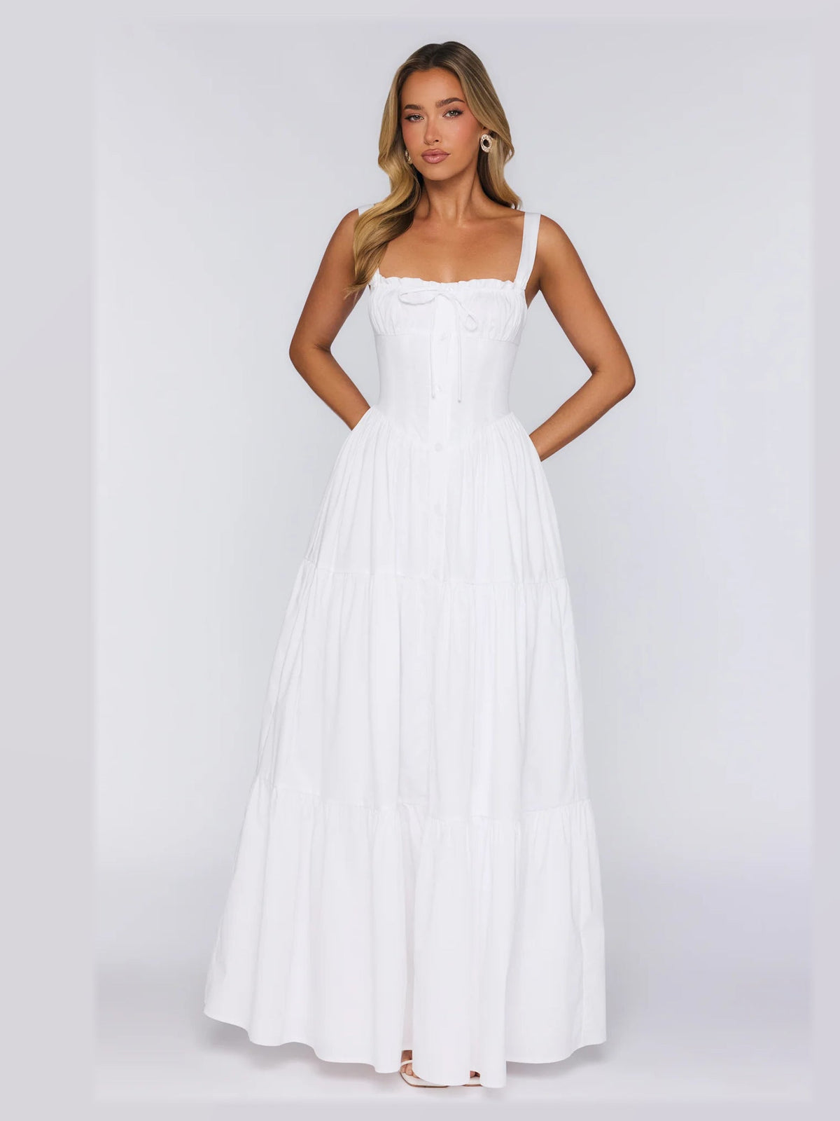 White formal dress with a-line silhouette and maxi length