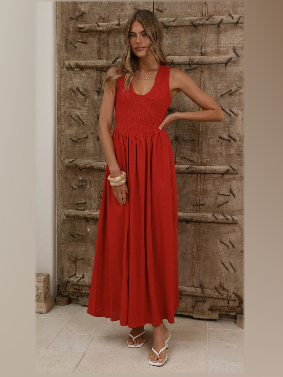 Red formal dress with a-line silhouette and maxi length