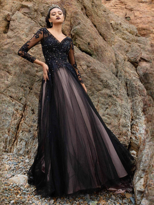 Black V-neck A-line wedding dress with corset bodice, sheer floral sleeves, and flowing skirt