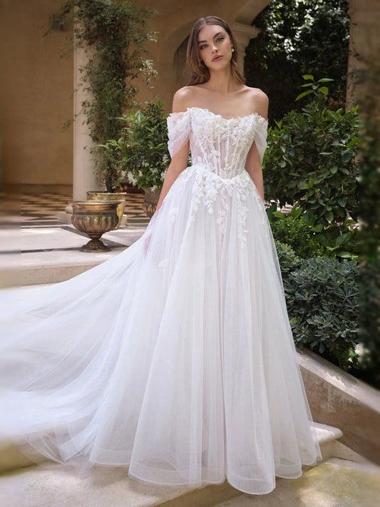 Ivory tulle A-line wedding dress with off-shoulder ruffled sweetheart bodice