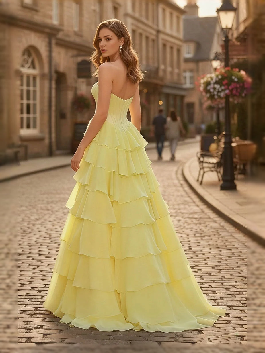 Canary-yellow sweetheart A-line prom dress with tiered ruffles, corset bodice, side slit