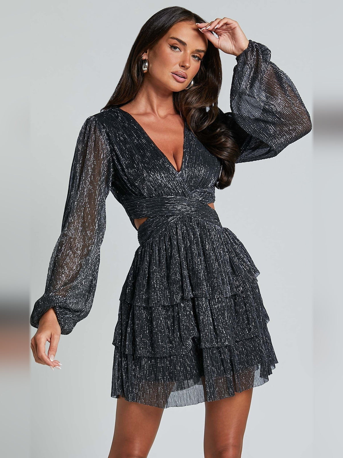 Black long-sleeve mini dress with V-neck and tiered ruffle skirt