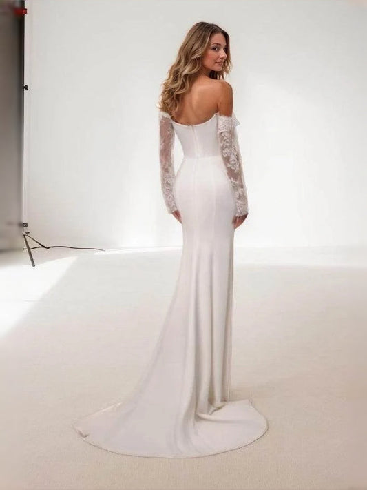 Ivory sweetheart mermaid wedding dress with lace long sleeves and ruched bodice