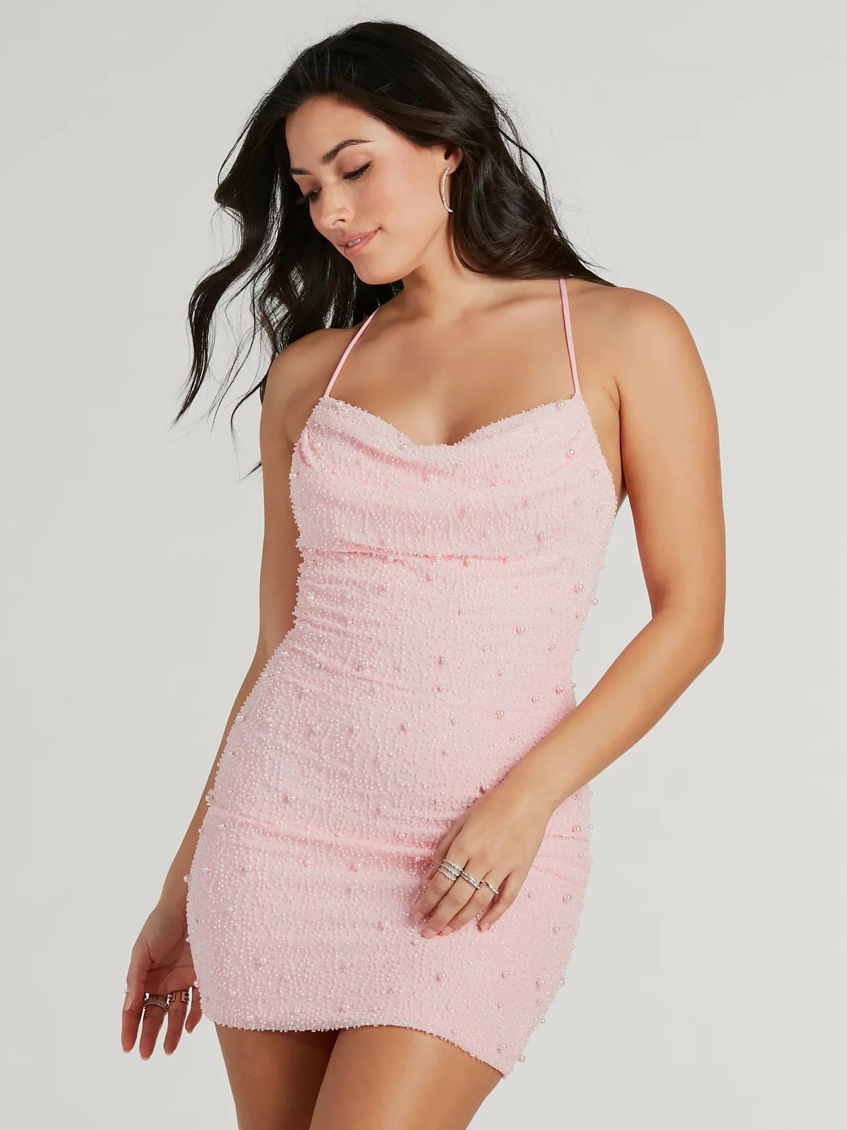Pink sequin mini homecoming dress with spaghetti straps and ruched sweetheart neckline
