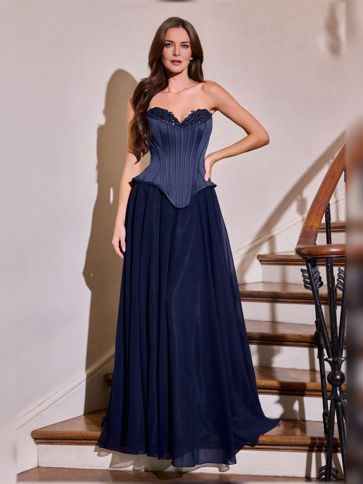 Dark navy halter corset formal dress with lace neckline and flowing floor-length skirt