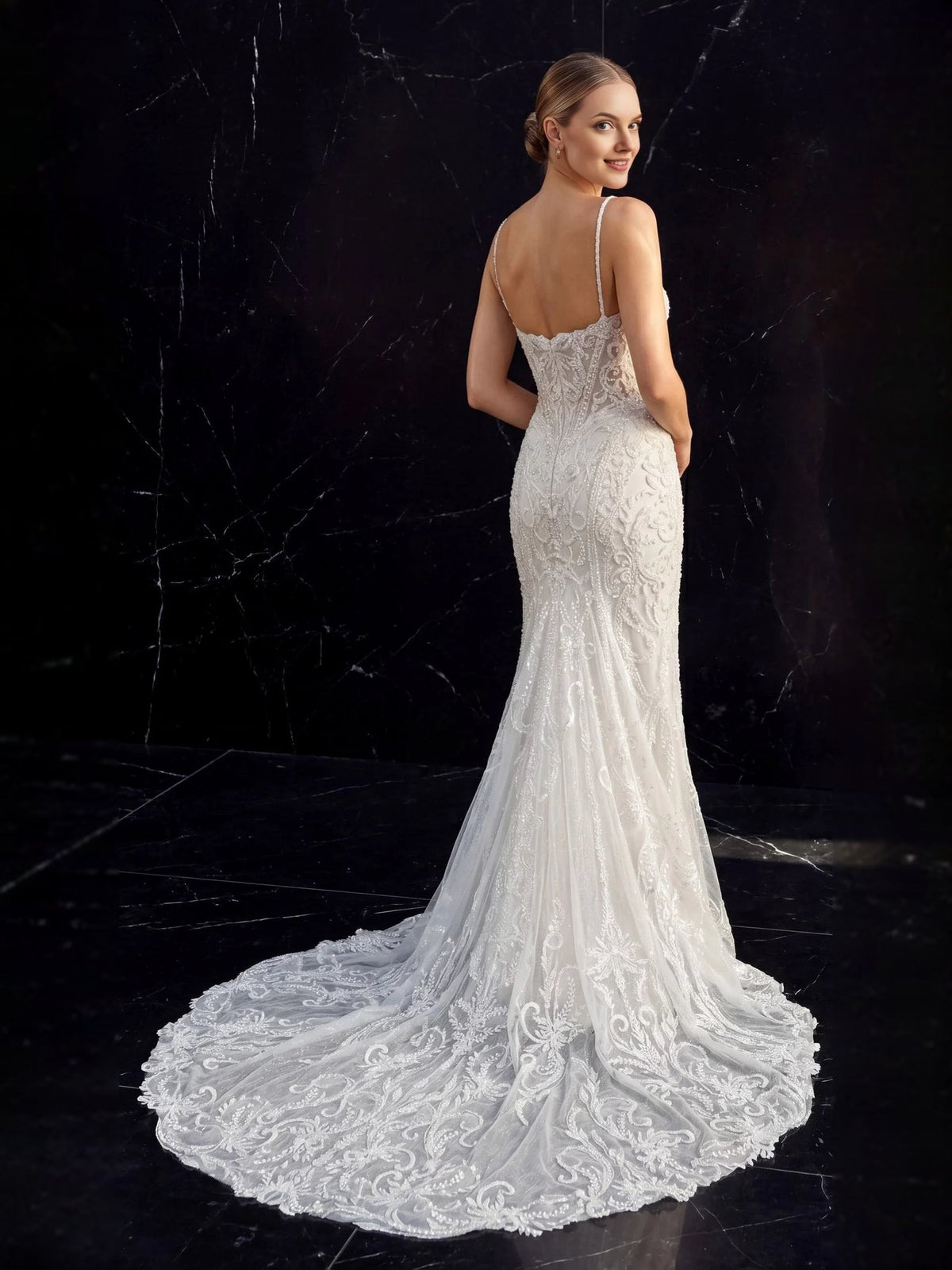 Ivory sweetheart mermaid wedding dress with beaded lace appliques and spaghetti straps