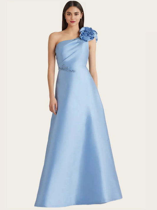 Light blue one-shoulder formal dress with beaded bodice and fabric flower shoulder