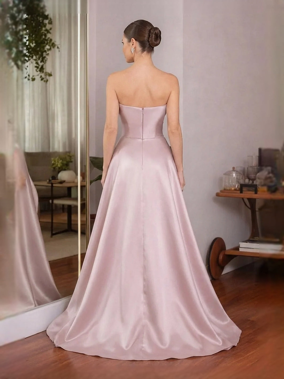 Blush pink satin A-line maxi prom dress with sweetheart bodice and open-back style